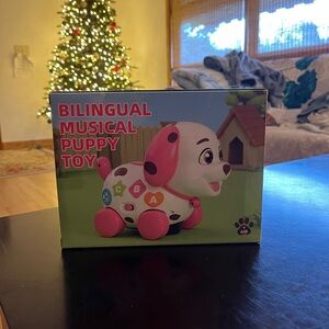 Amazon Bilingual Musical Puppy Toy - Pink and White